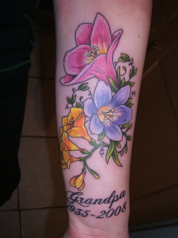 Corinne had Freesias  dads fave flowers  with Grandpa and his life 