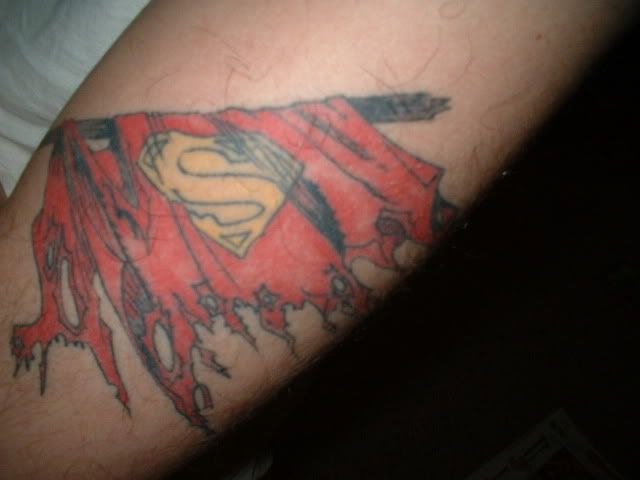 Here's my Death of Superman tattoo. I think any tattoos are cool as long as 