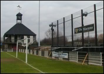 Fisher_behind_goal_with_pavilion.jpg