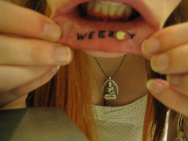 lil wayne lip tattoo