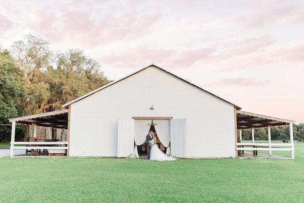  A Dusty Blue Barn Wedding with Romantic Details Galore