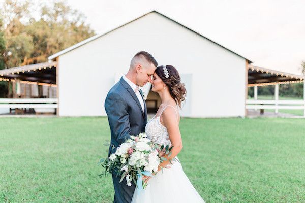  A Dusty Blue Barn Wedding with Romantic Details Galore
