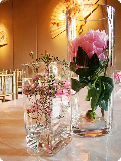 centerpieces wax flowers faux peonies cherry blossoms in glasses 