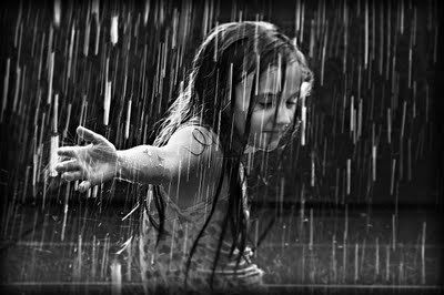 Young Girl In The Rain
