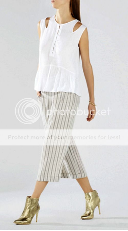 white sleeveless peplum top